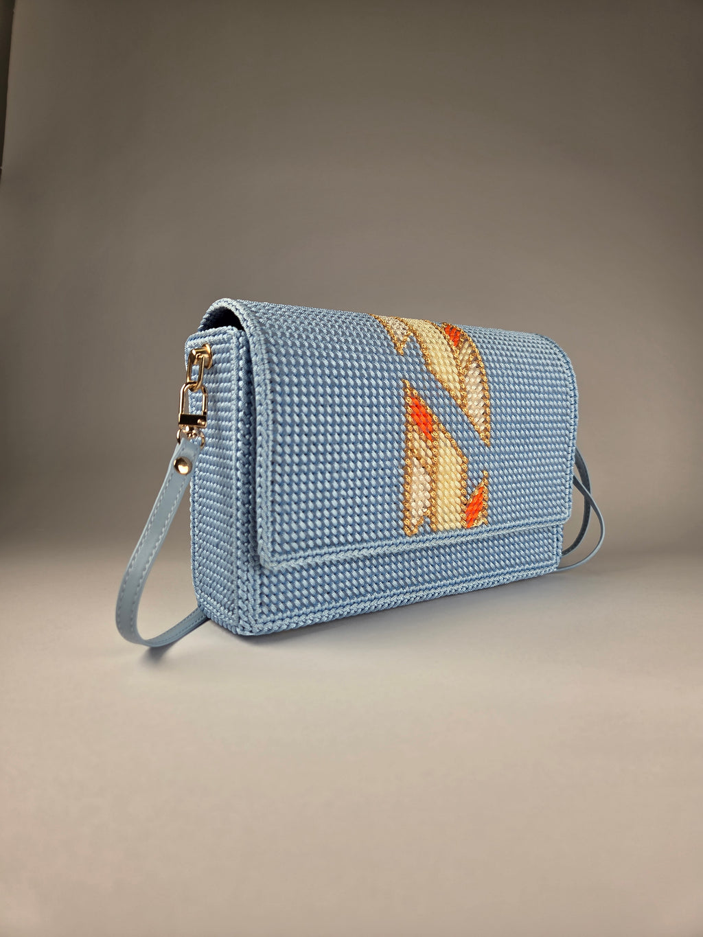 Embroidered Canvas Crossbody Bag in Light Blue – Warm Accent Pattern & Lining