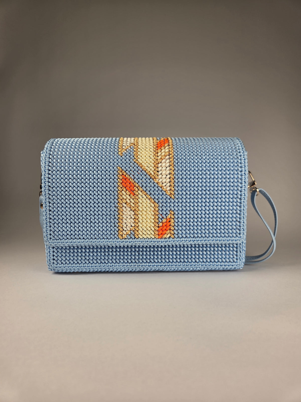 Embroidered Canvas Crossbody Bag in Light Blue – Warm Accent Pattern & Lining